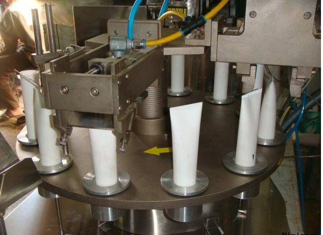 Tube filling and sealing